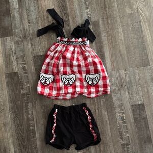 Red Checkered Dress with Bulldog Design and Black Shorts